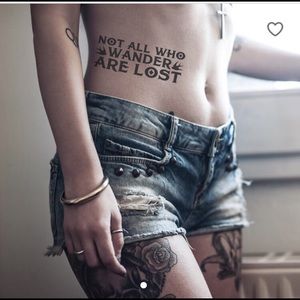 Not all who wander are lost 🌸🌸🌸🌸 tattoo